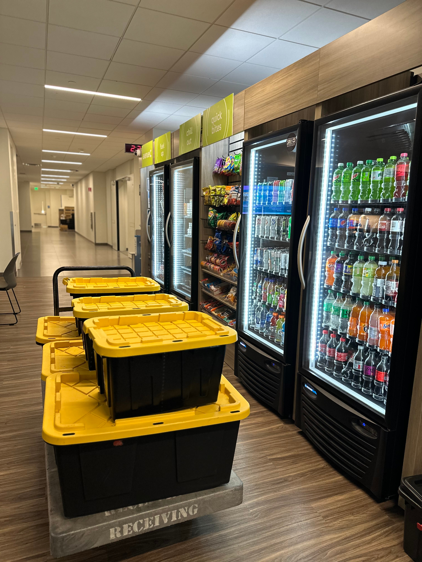 Coolers placed along a building corridor for residents and staff